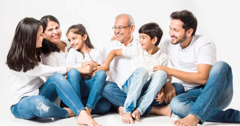 A family embracing, symbolizing peace and security after securing final expense coverage